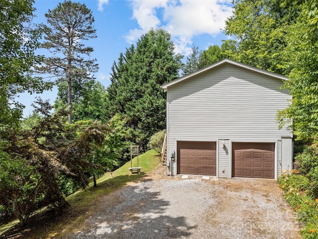 view of property exterior with a garage