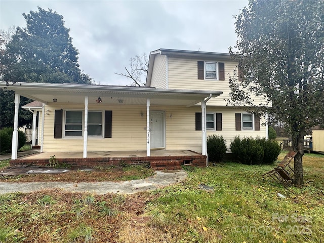 view of front of property featuring covered porch