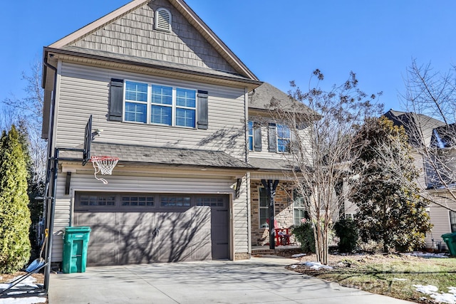 view of front of home with a garage