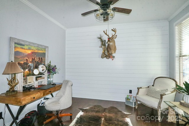 home office with ceiling fan, crown molding, and dark wood-type flooring