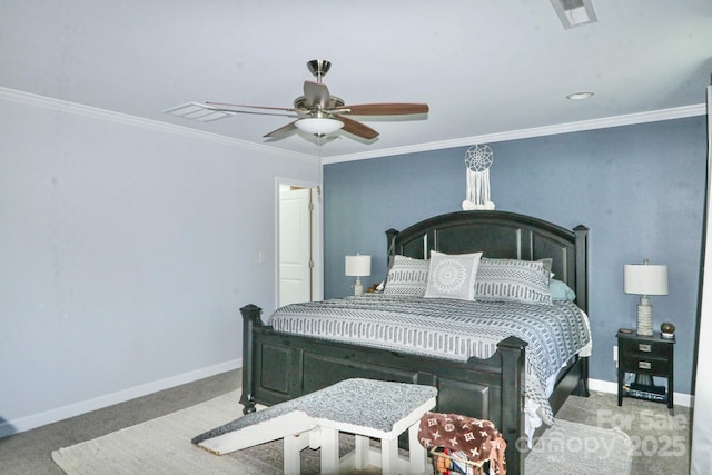 bedroom with ceiling fan, ornamental molding, and carpet floors