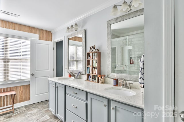 bathroom featuring vanity and ornamental molding