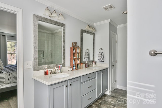 bathroom featuring crown molding, vanity, and a shower with shower door