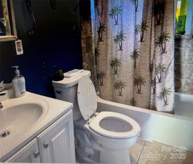 bathroom featuring vanity, tile patterned floors, and shower / bathtub combination with curtain