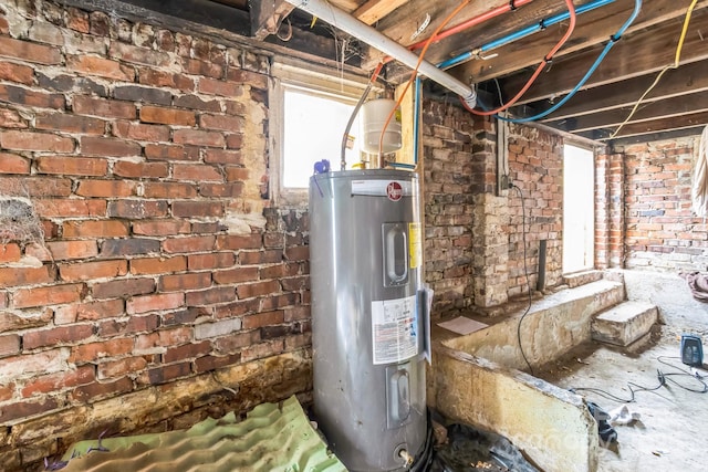 utility room with electric water heater