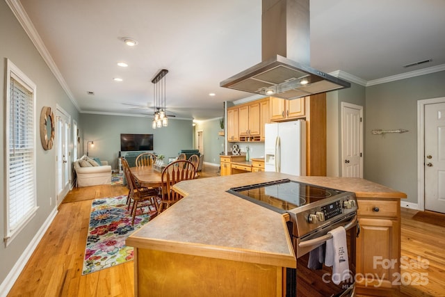 kitchen with island range hood, crown molding, electric range, a kitchen island, and white fridge with ice dispenser