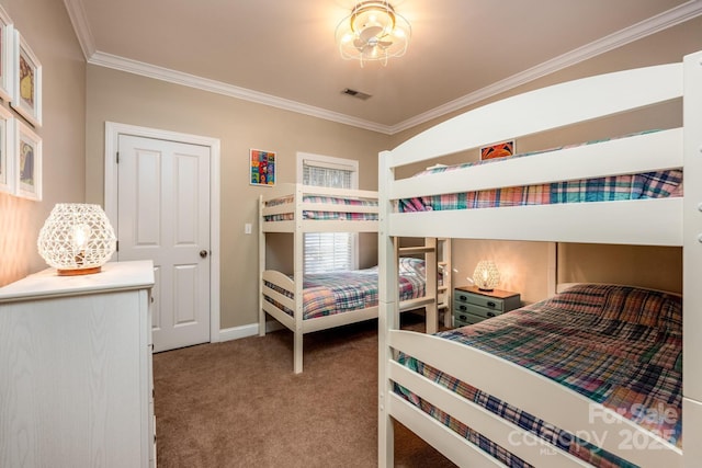 bedroom with carpet flooring and ornamental molding