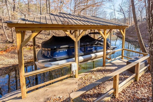 view of dock featuring a water view