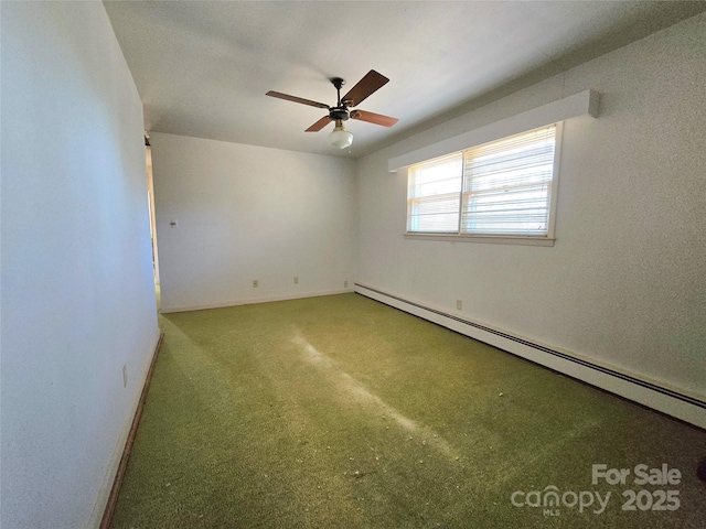 spare room featuring a baseboard radiator and ceiling fan