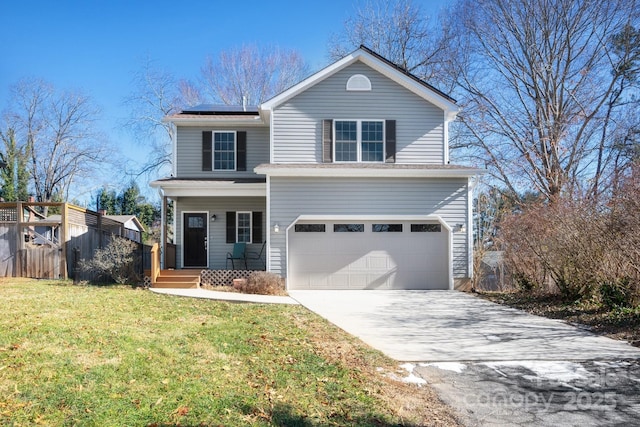 view of front property with a front yard, a garage, a porch, and solar panels