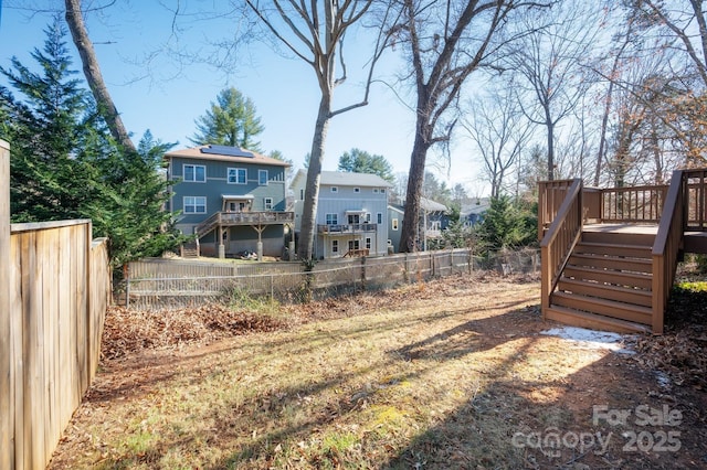 view of yard with a deck