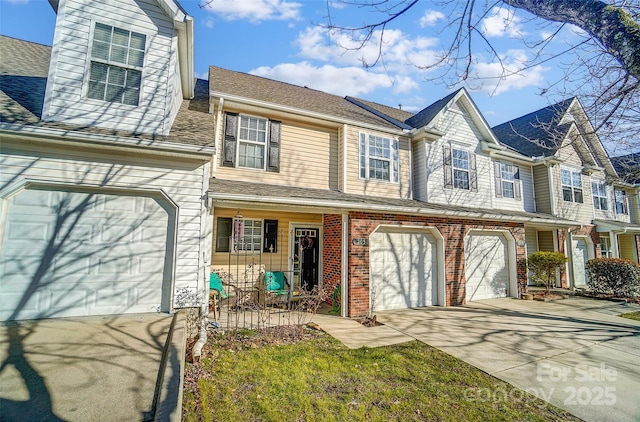 multi unit property featuring a garage