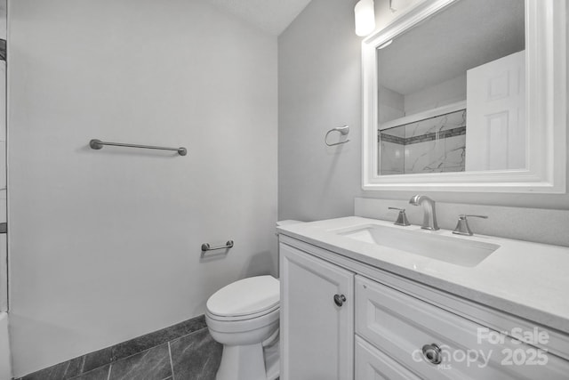 bathroom with vanity, tile patterned floors, toilet, a textured ceiling, and an enclosed shower