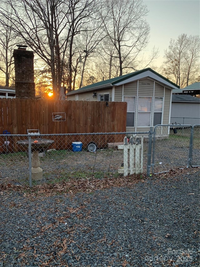 view of property exterior at dusk