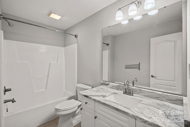 full bathroom with toilet, vanity, tub / shower combination, and tile patterned flooring