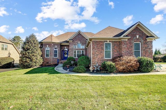 view of front of home with a front lawn