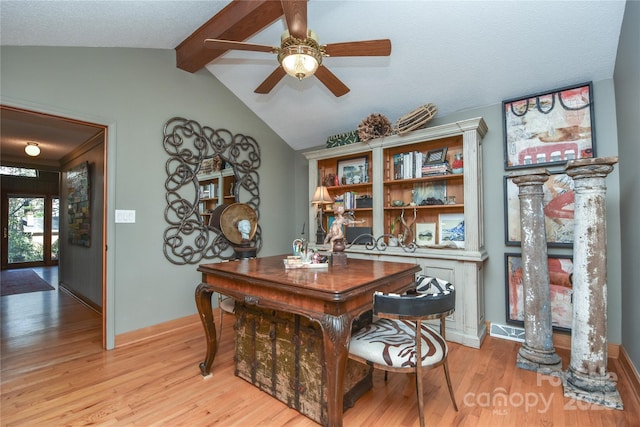 office with vaulted ceiling with beams, ceiling fan, light wood-type flooring, and a textured ceiling