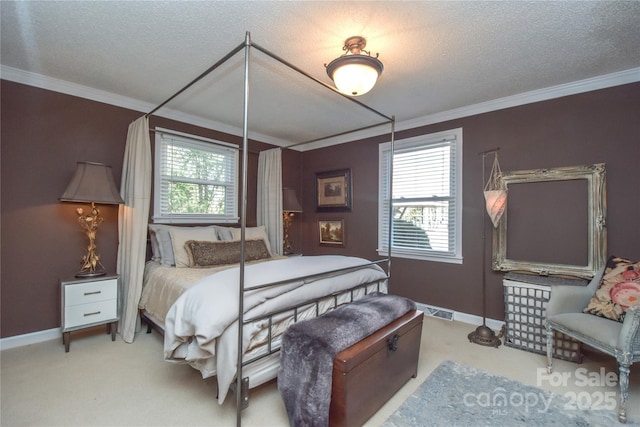 bedroom featuring crown molding, light colored carpet, and a textured ceiling