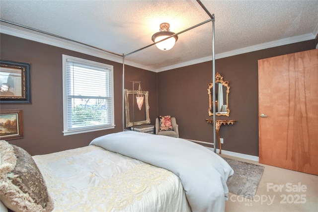 bedroom with crown molding and a textured ceiling