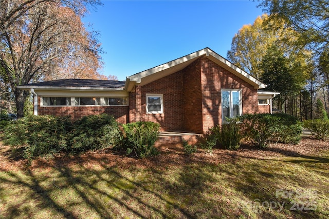 exterior space with a front yard