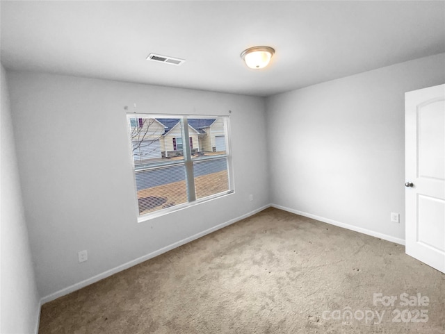 unfurnished room featuring carpet floors