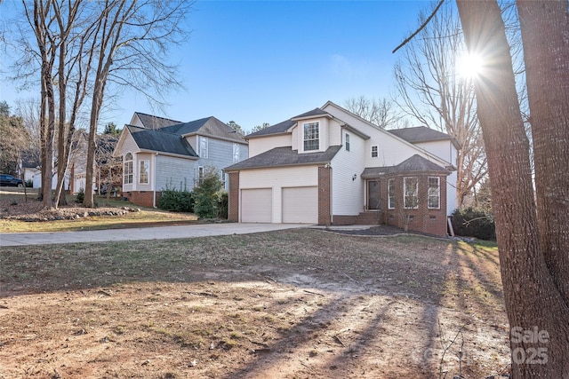 view of side of property featuring a garage