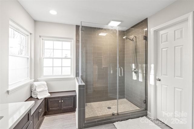 bathroom featuring vanity and walk in shower