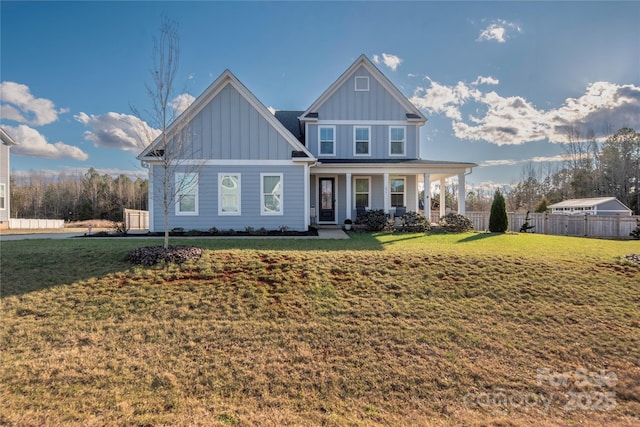 view of front of house featuring a front yard and a porch