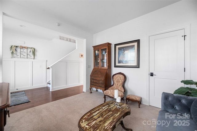 sitting room with dark carpet