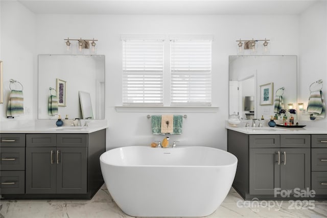 bathroom with a bathing tub and vanity