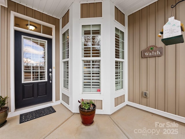 doorway to property featuring a porch