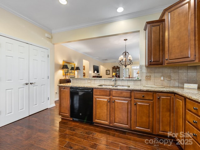 kitchen with crown molding, dishwasher, an inviting chandelier, and sink