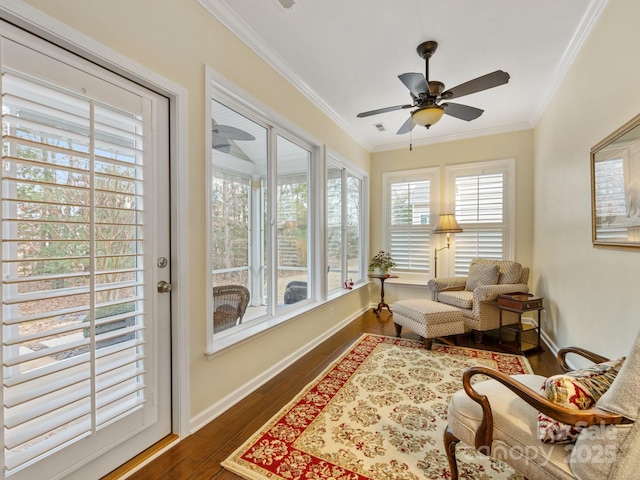 sunroom / solarium with ceiling fan