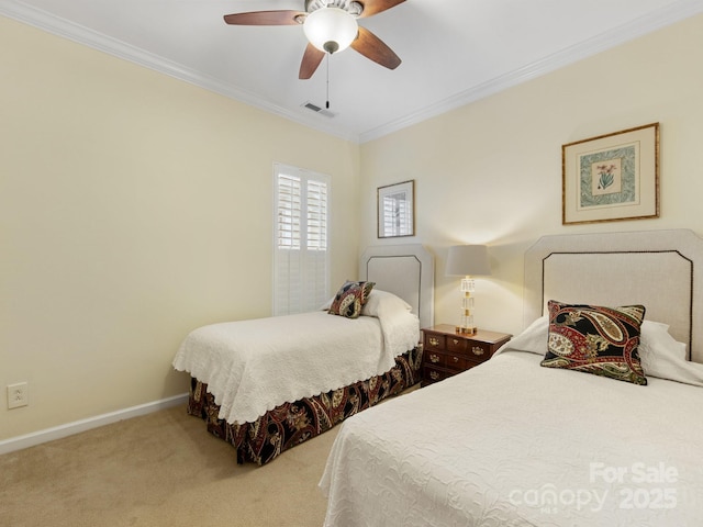 carpeted bedroom featuring ceiling fan and ornamental molding