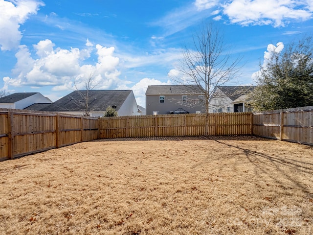 view of yard featuring a fenced backyard