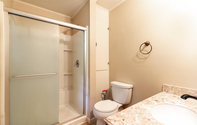 full bath featuring toilet, a shower stall, crown molding, and vanity