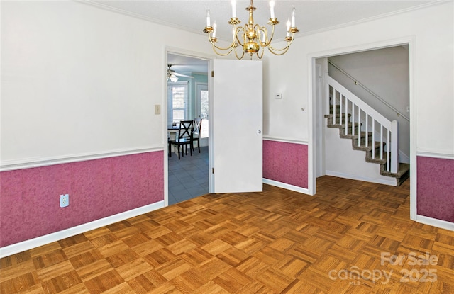 unfurnished room with dark parquet flooring and ornamental molding