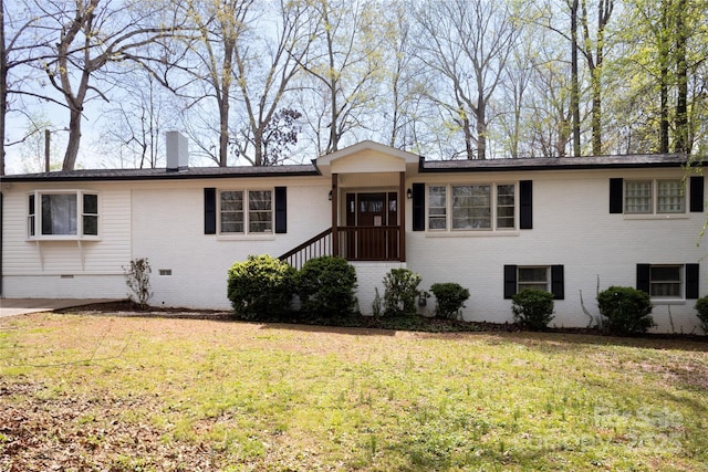 1035 Timberlane Dr, Lincolnton, NC 28092 - view of front of property with brick siding, a front yard, crawl space, and a chimney
