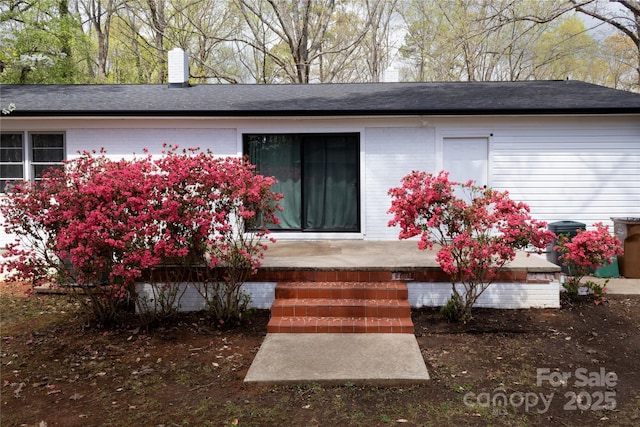 1035 Timberlane Dr, Lincolnton, NC 28092 - doorway to property with a chimney and a shingled roof