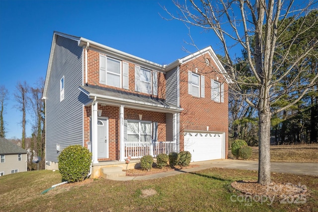 view of front of property featuring a garage and a front lawn