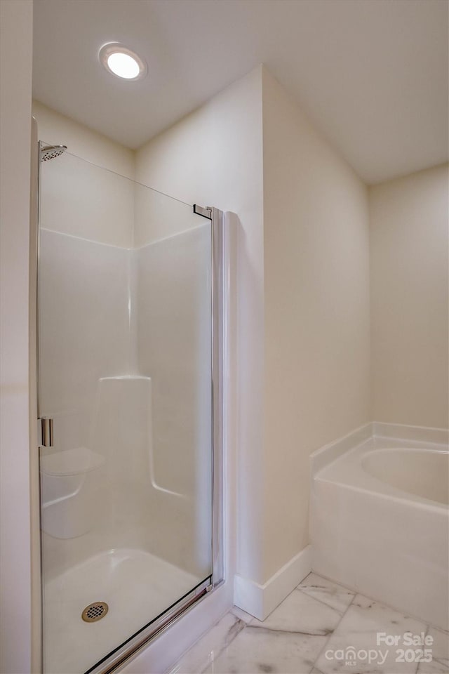 bathroom featuring walk in shower