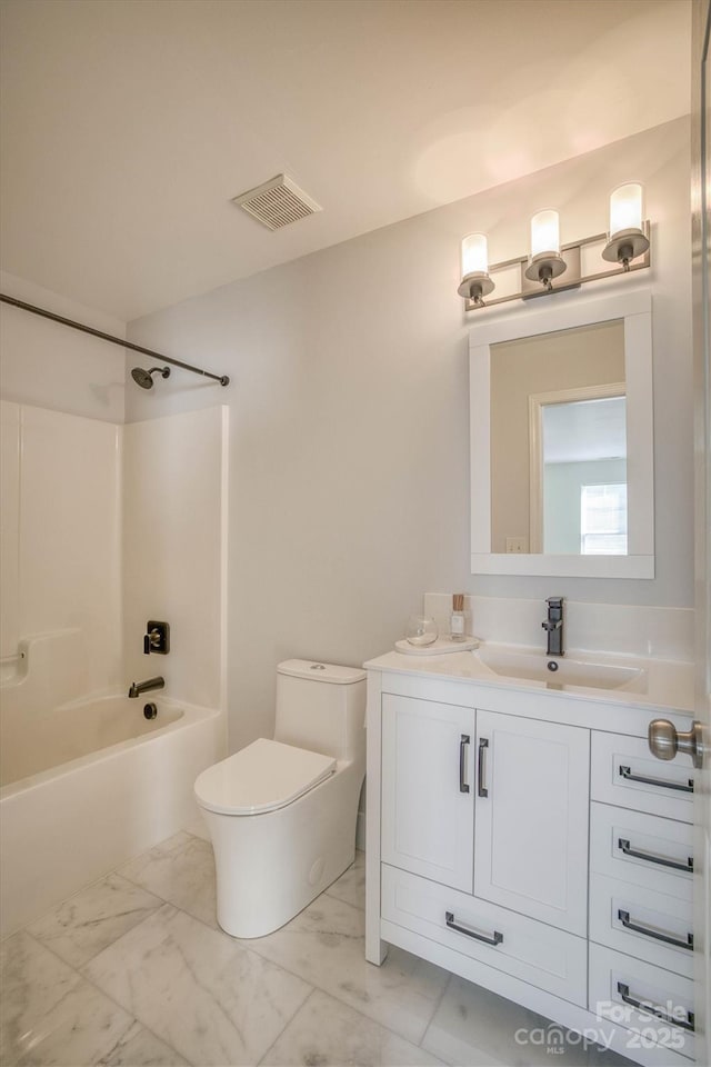 full bathroom featuring shower / washtub combination, vanity, and toilet