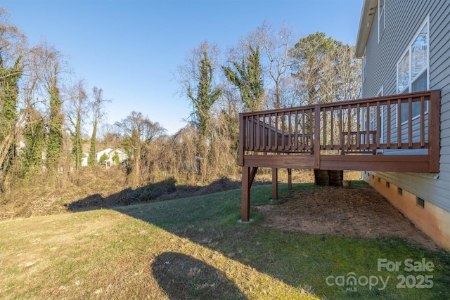 view of yard featuring a wooden deck