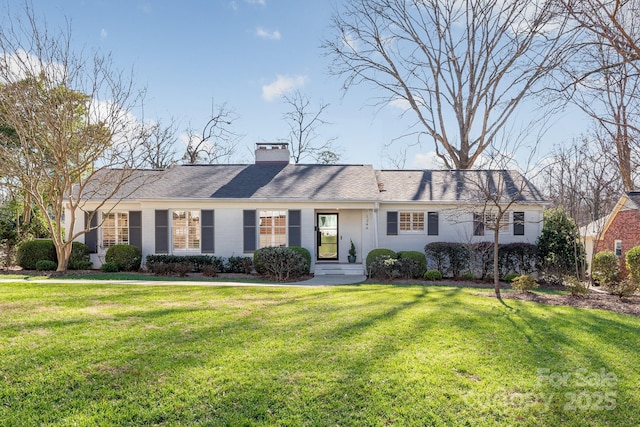 single story home with a front lawn