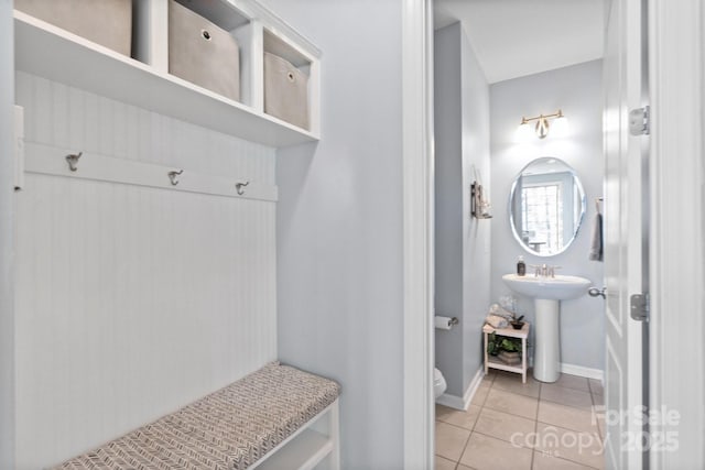 mudroom featuring light tile patterned floors