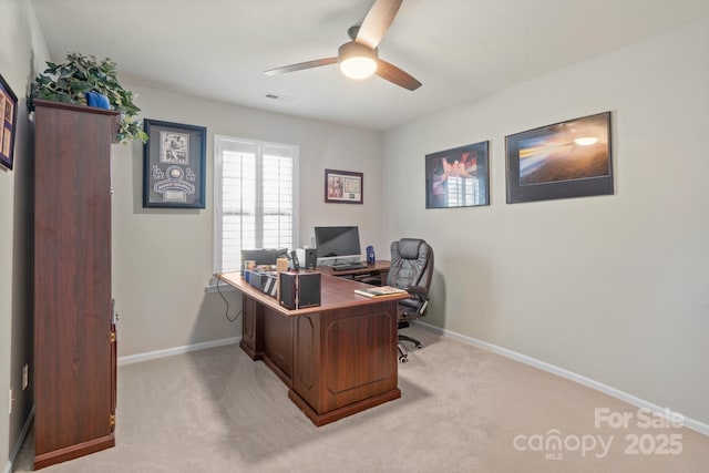 office with ceiling fan and light colored carpet