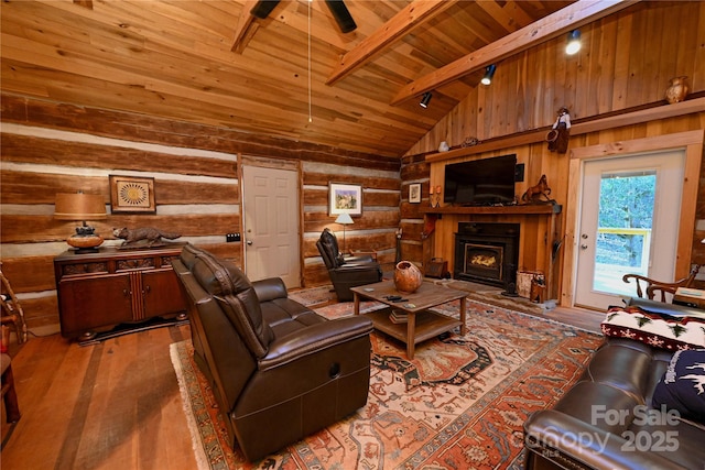 living room with ceiling fan, log walls, beam ceiling, wood-type flooring, and wood ceiling