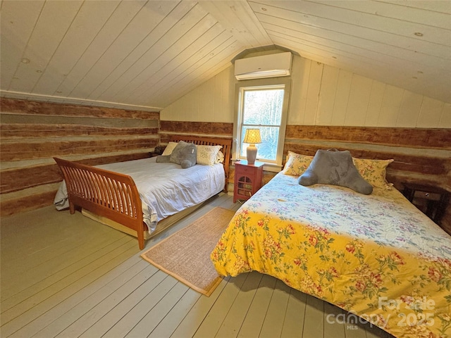 bedroom featuring a wall mounted air conditioner, wood-type flooring, vaulted ceiling, and wooden walls