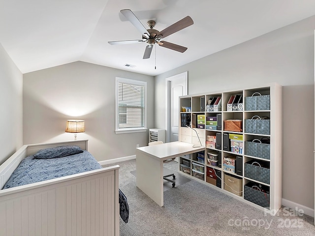 bedroom with ceiling fan, light colored carpet, and lofted ceiling