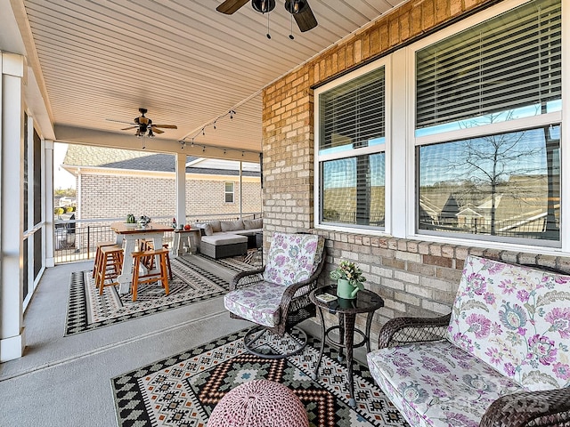 view of patio featuring ceiling fan and an outdoor hangout area